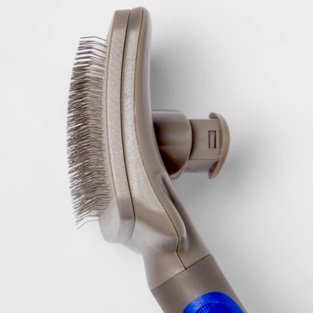 Pet grooming brush